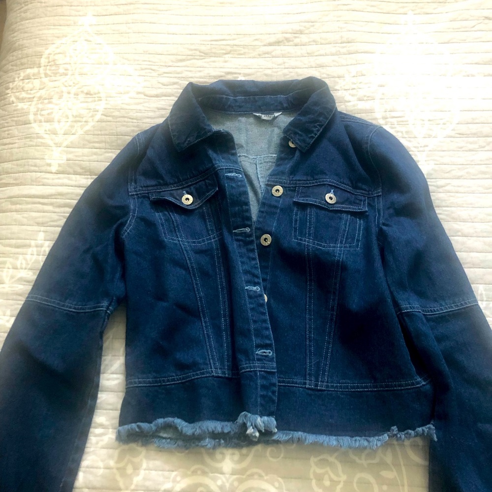 BB Dakota denim jacket. Size medium with frayed edges and slight peplum bottom.
